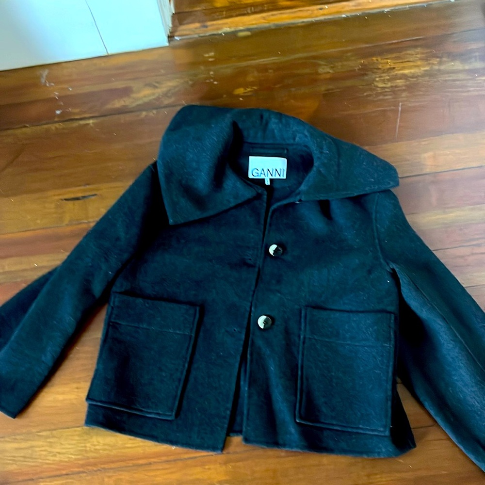Size 36. 50 percent wool
